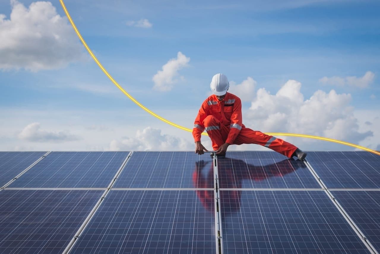 man on solar panel background